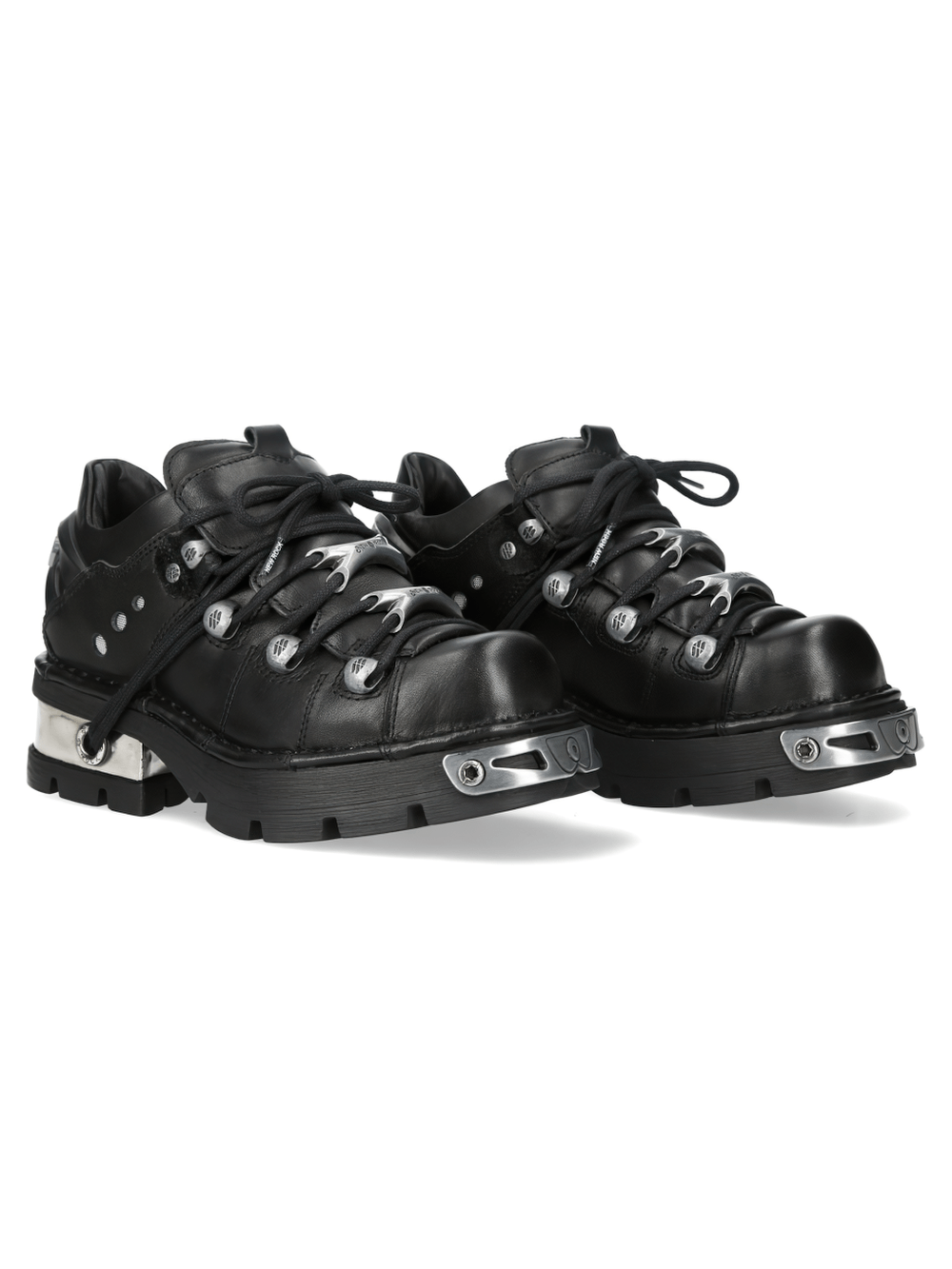 NEW ROCK Women's Black Urban Ankle Boots with Lug Sole featuring metal trim and chunky lug sole.