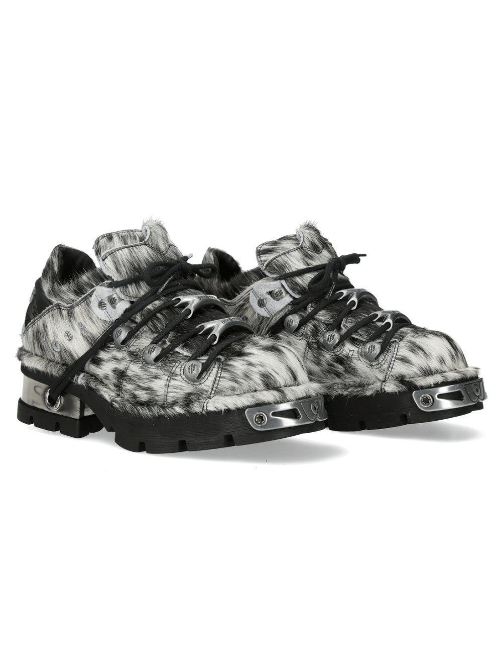 NEW ROCK Women's Cow Pattern Platform Shoes with Toe Caps in black and white with silver flame accents.