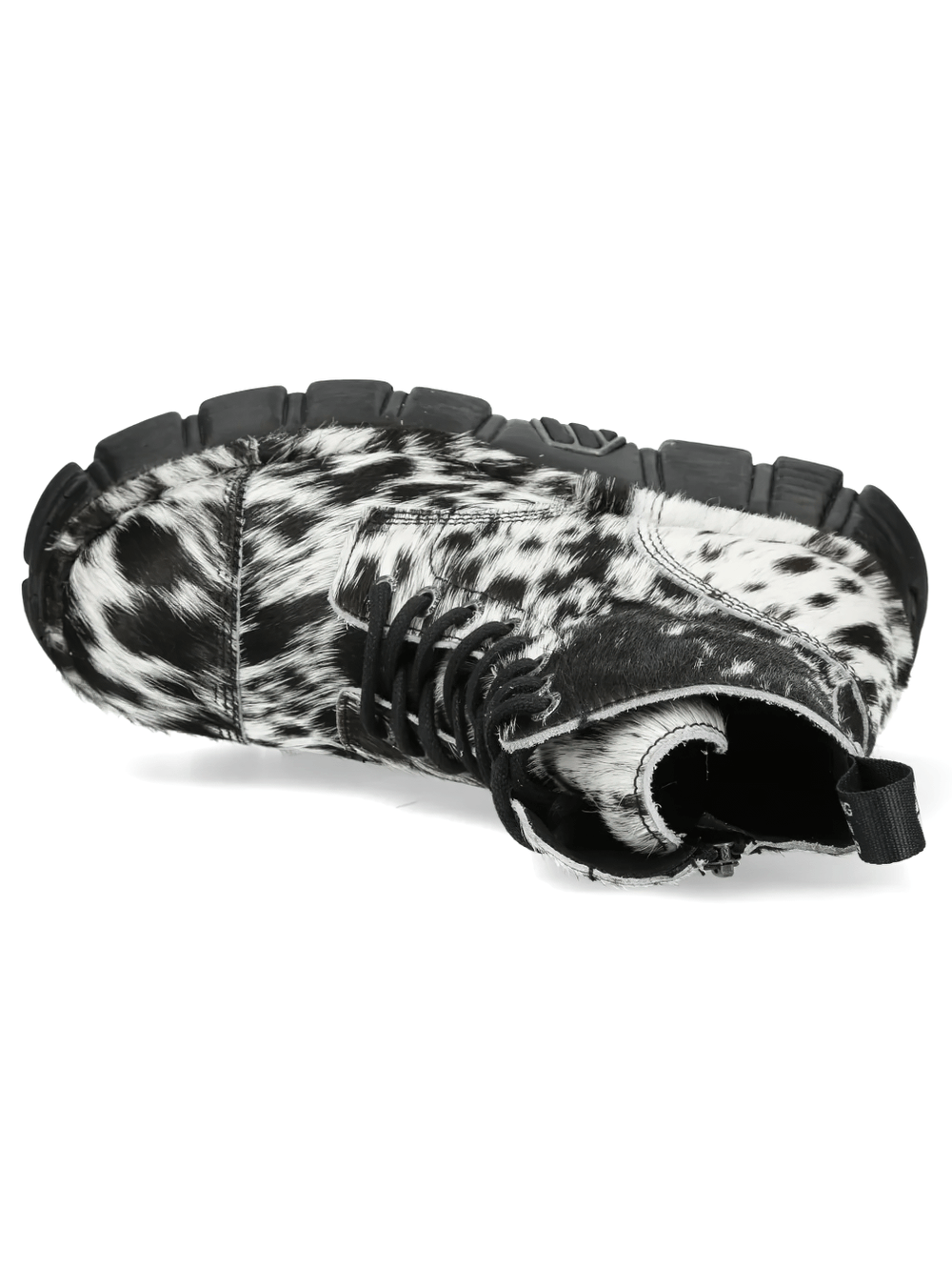 NEW ROCK Women's Cow Print Gothic Boots with Lug Sole showcasing distinct black and white cow print design.
