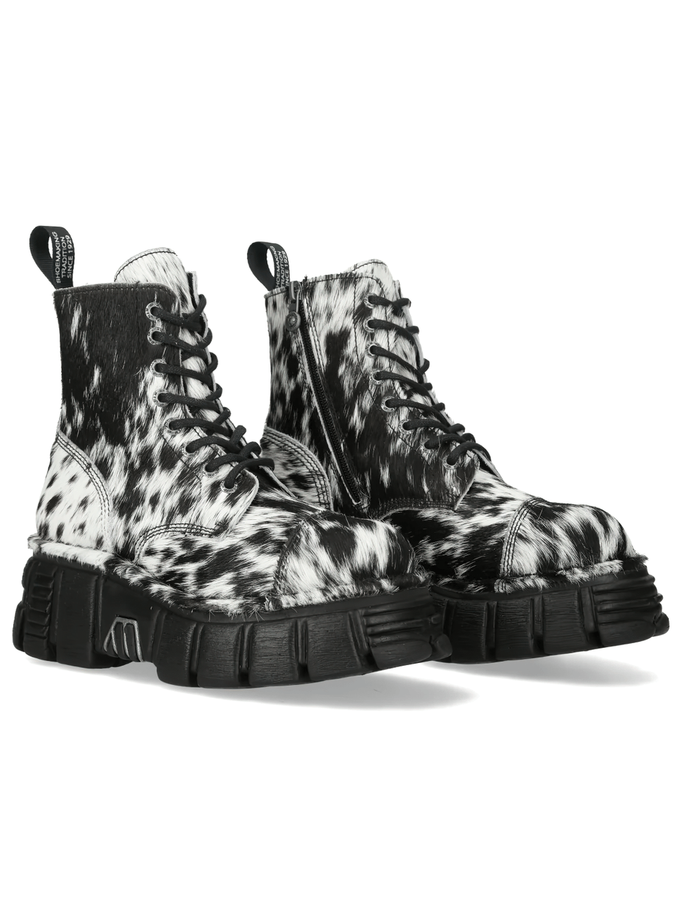 NEW ROCK Women's Cow Print Gothic Boots with Lug Sole showcasing black and white cow print and rugged combat style.
