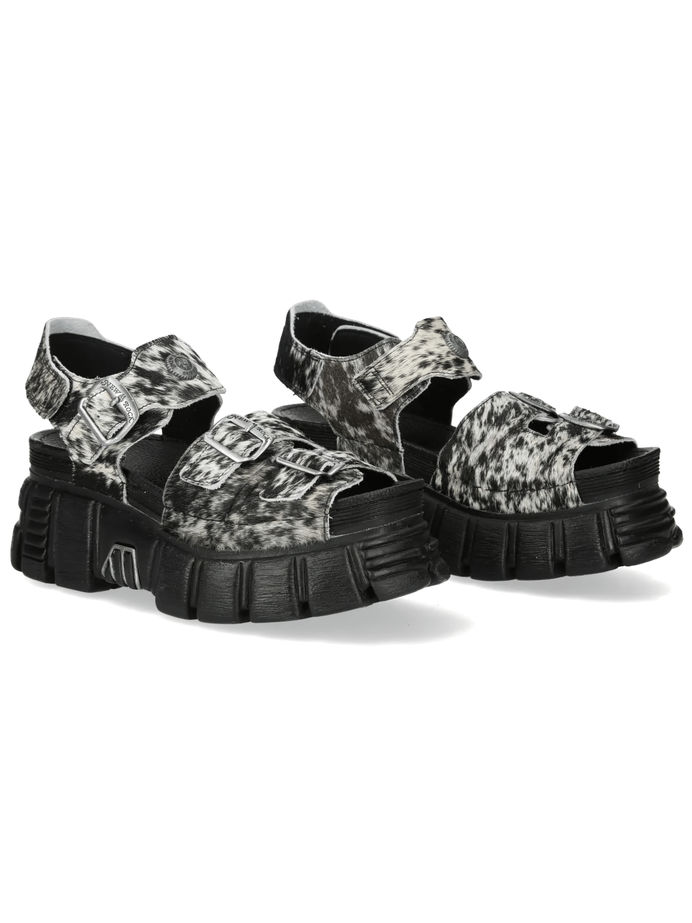 NEW ROCK Women's Cow Print Punk Sandals with Buckles featuring black and white animal print and bold tread soles.