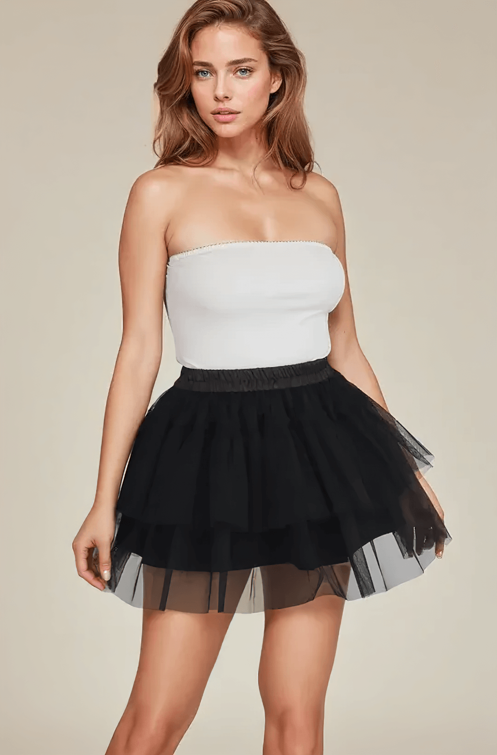 Niko Layered Black Tulle Skirt for Gothic and Party Looks styled with a strapless top, showcasing its flouncy tiers.