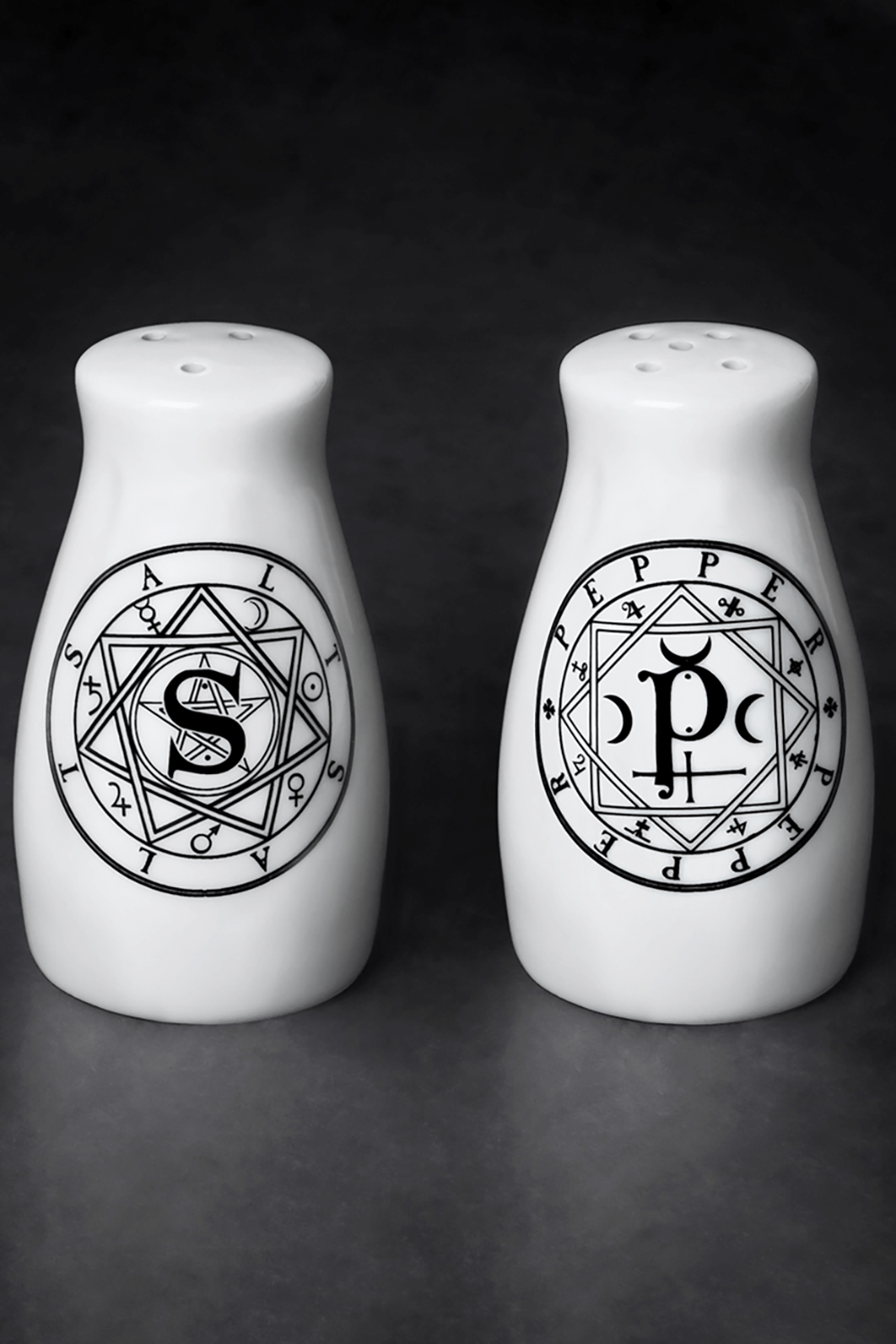 Occult Sigil Salt and Pepper Shaker Set by Alchemy featuring mystical symbols for a gothic kitchen decor.