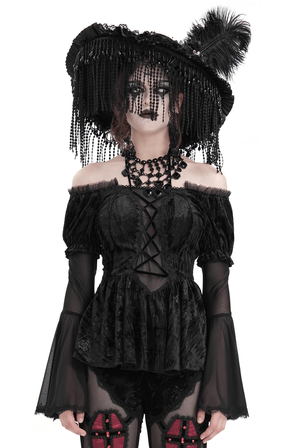 Gothic elegance with an off-shoulder velvet top, sheer bell sleeves, and lace trim perfect for dark romance style.