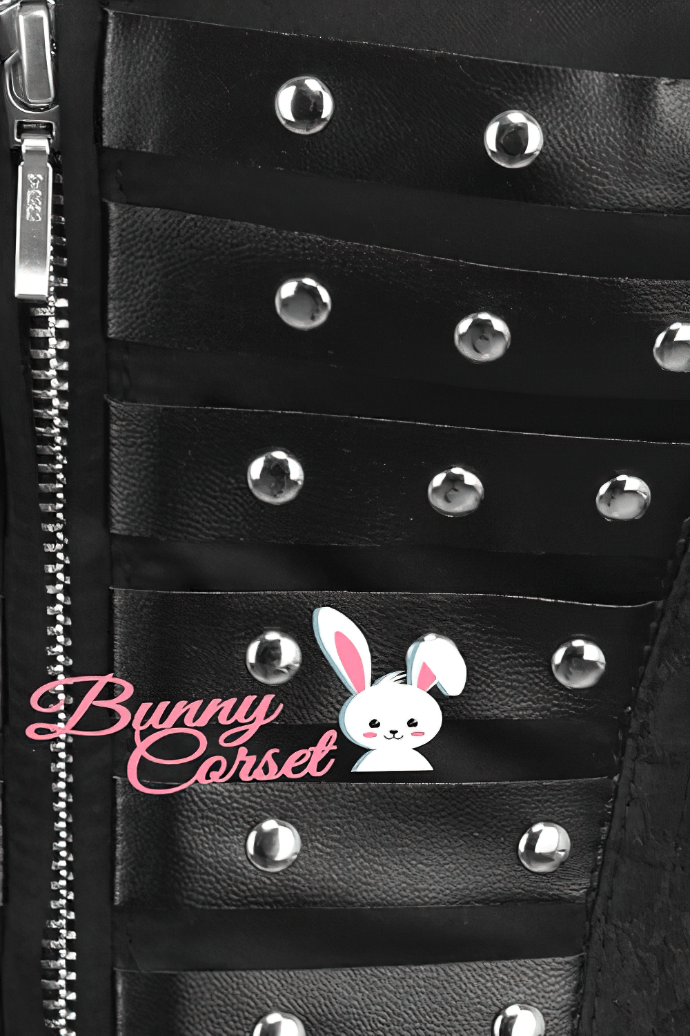 Close-up of Ohio overbust corset featuring studded faux leather details and front zipper.