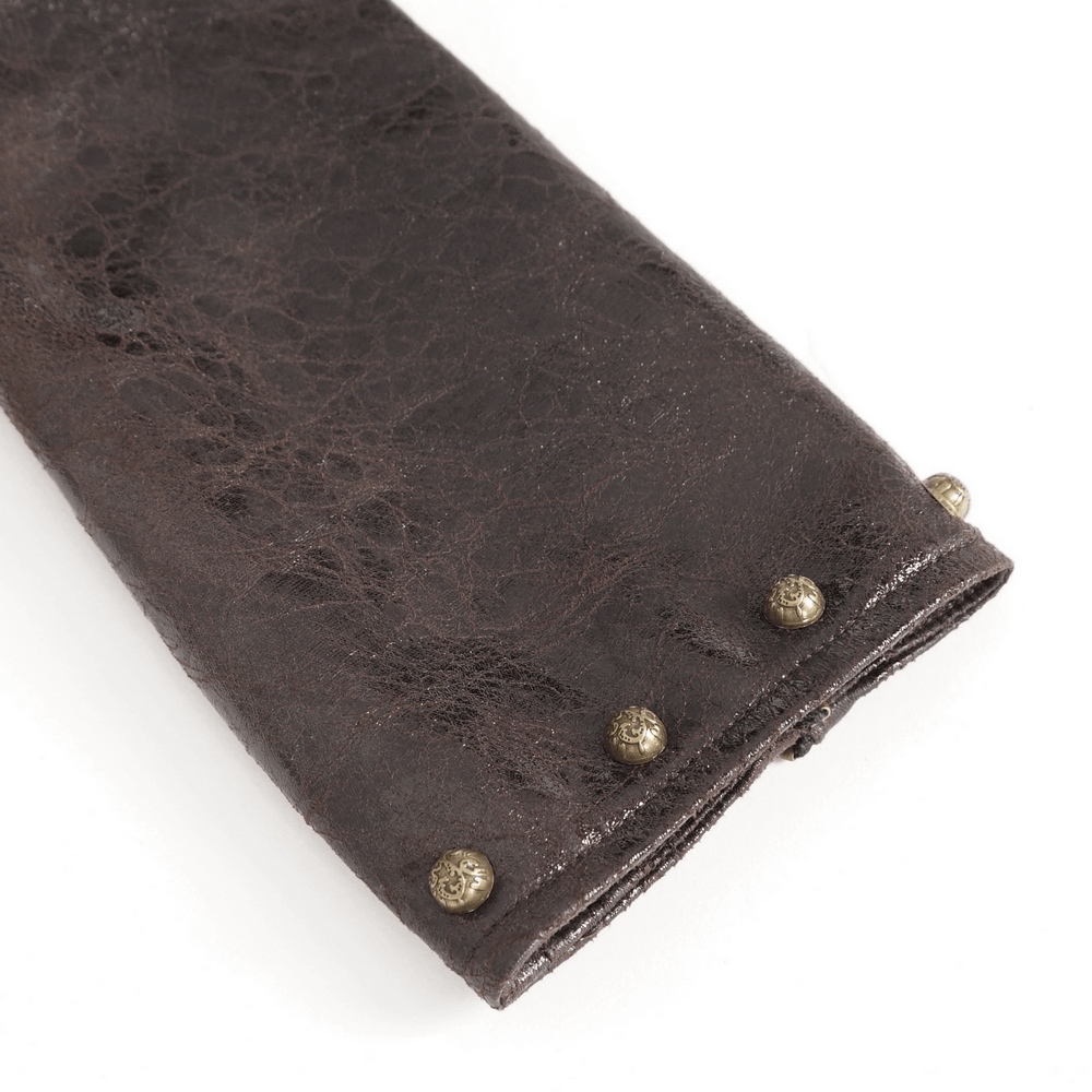 Dramatic brown leather cuff with golden studs, perfect for gothic and punk fashion accessory.