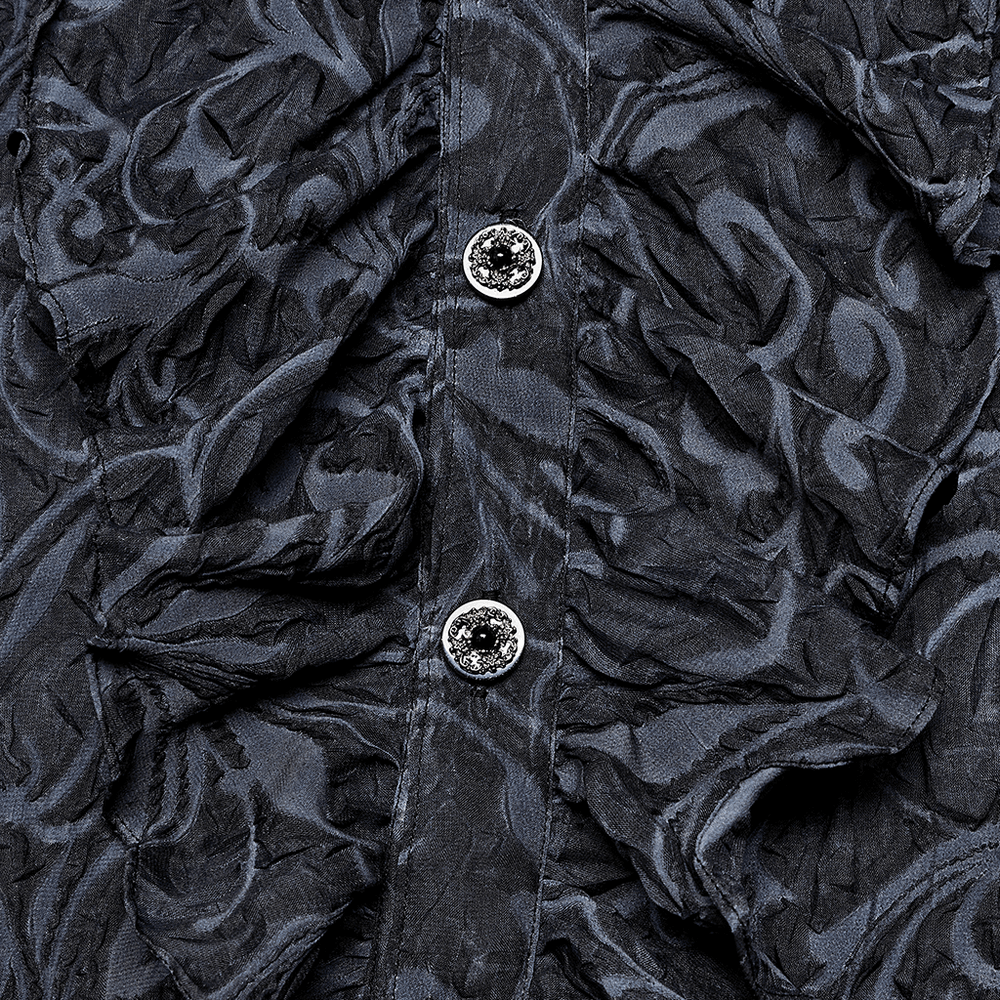 Close-up of ornate Gothic embossed shirt fabric and hand-sewn buttons for a luxurious dark elegance.