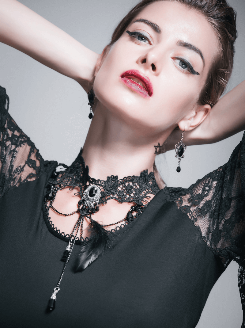 Elegant gothic lace necklace featuring crystals, worn by a model showcasing stylish black accessories.