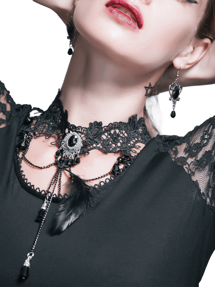 Elegantly styled woman wearing a Gothic lace necklace with crystal and feather accents, perfect for gothic fashion.