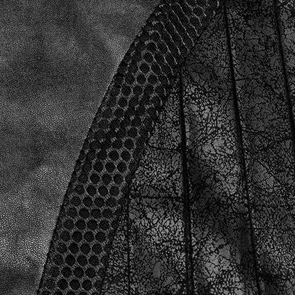Close-up of the unique texture of a black PU leather skirt featuring mesh and pleated design details.