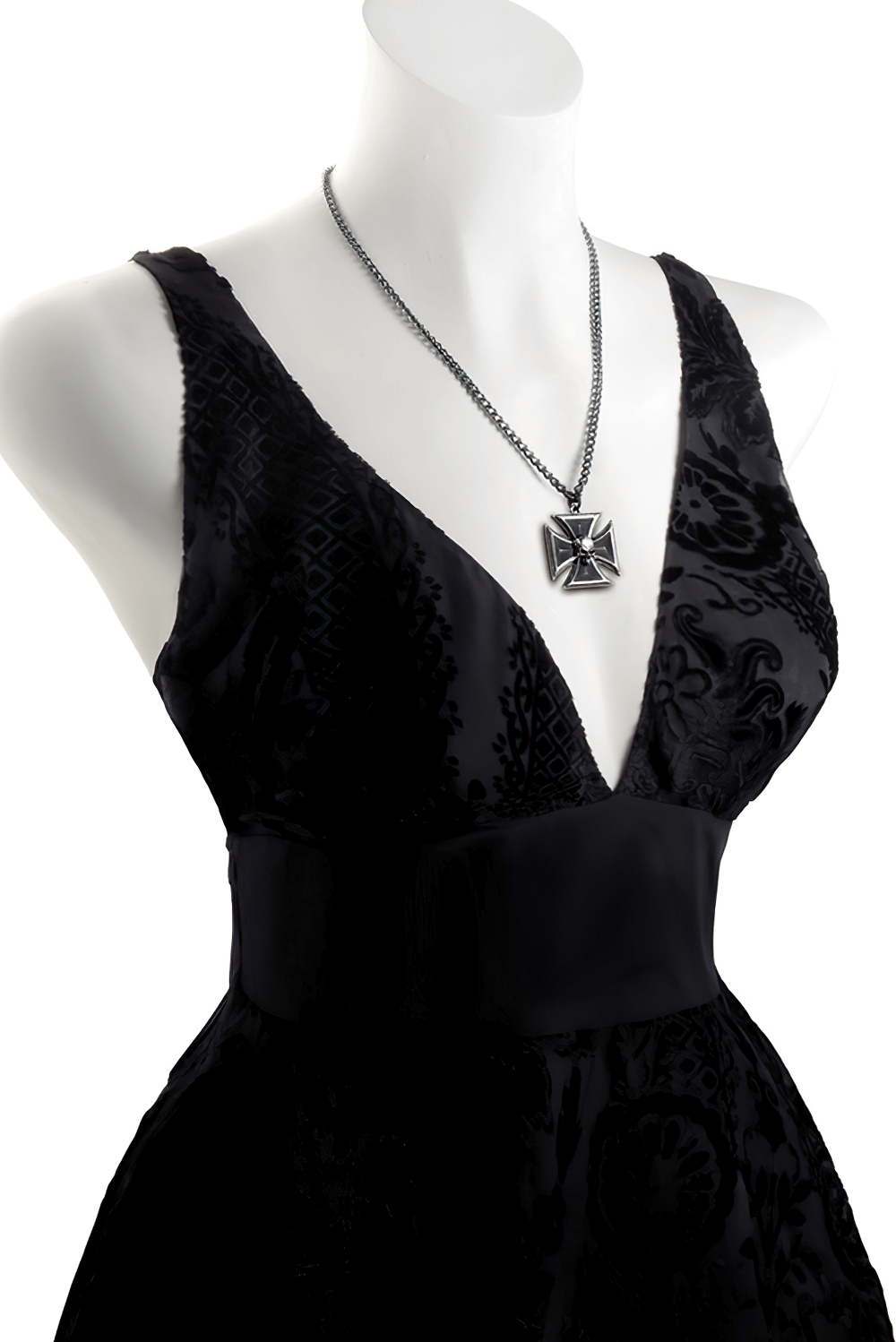 Elegant black dress displayed on a mannequin with a pewter Iron Cross pendant and chain necklace.