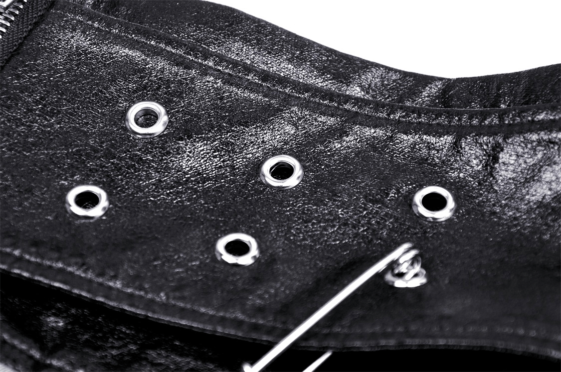 Close-up of edgy leather belt with grommet detail, perfect for punk rock style outfits.