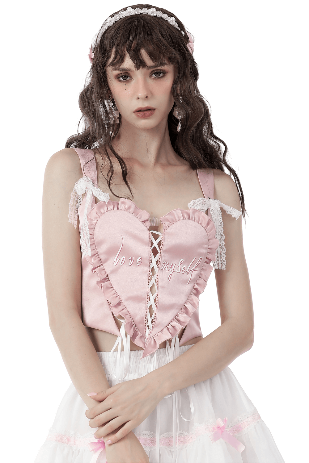 Gothic pink heart-shaped bustier top with lace-up front and ribbon details.