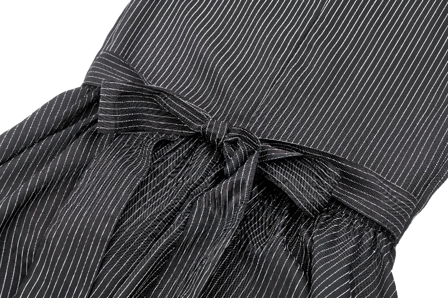 Close-up of pinstripe fabric with a bow detail, showcasing the gothic dress's elegant design and romantic flair.