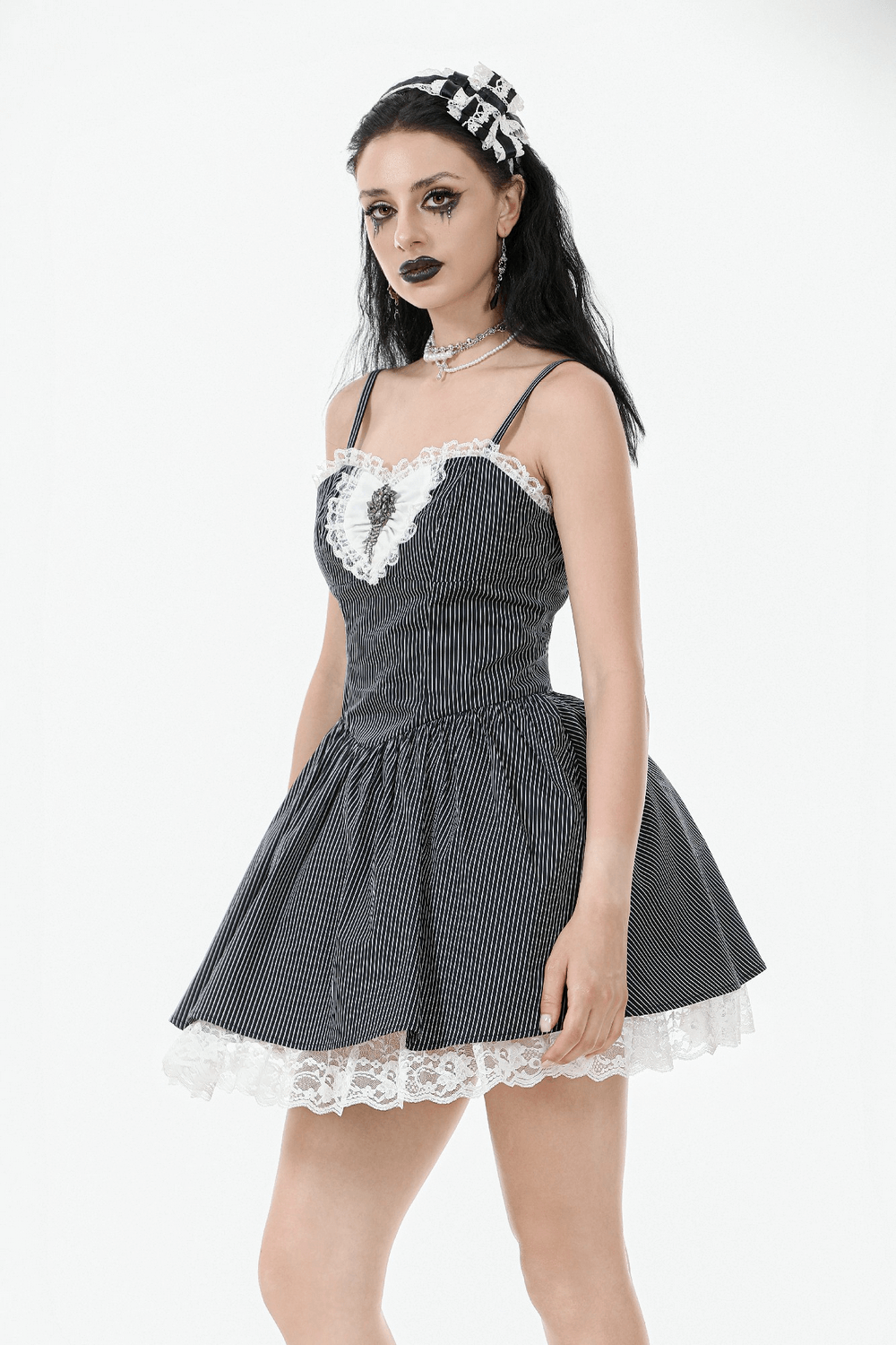 Vintage pinstripe Gothic dress with ruffled lace, heart-shaped neckline, and corset back for a romantic look.