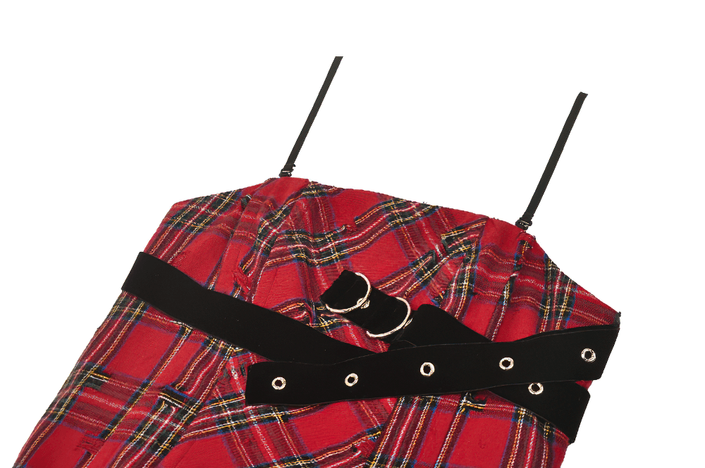 Red plaid corset dress close-up with edgy black straps and buckle details, perfect for punk-inspired fashion.