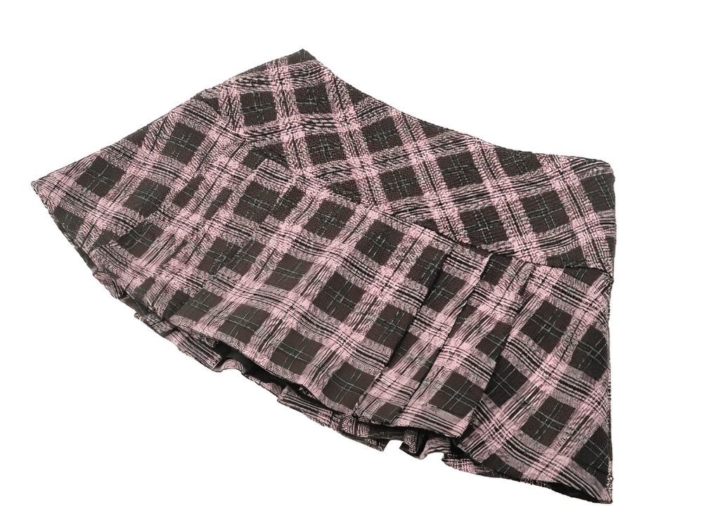 Trendy plaid mini skirt with pink and black pattern, pleated design, perfect for chic outfits and casual outings.