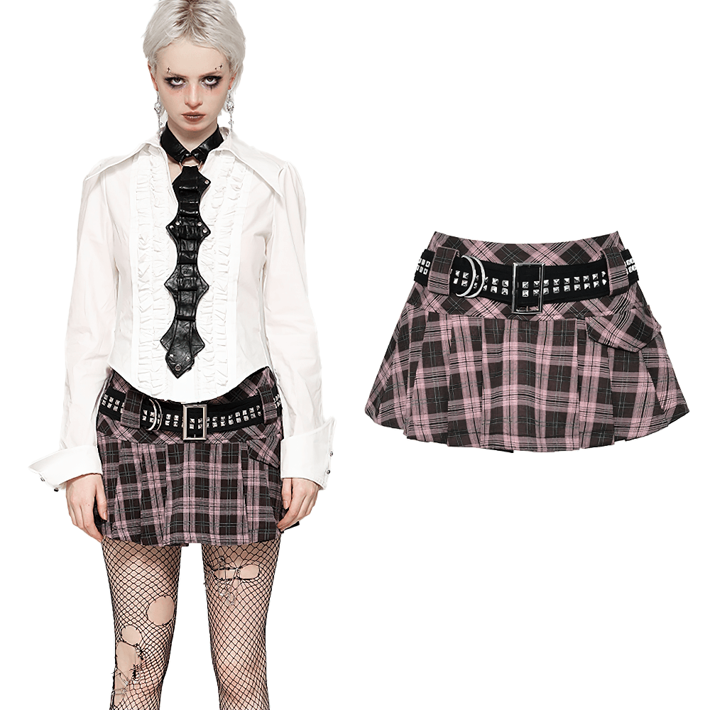 Chic plaid mini skirt with studded belt and pleated design, paired with a stylish white blouse for a trendy outfit.
