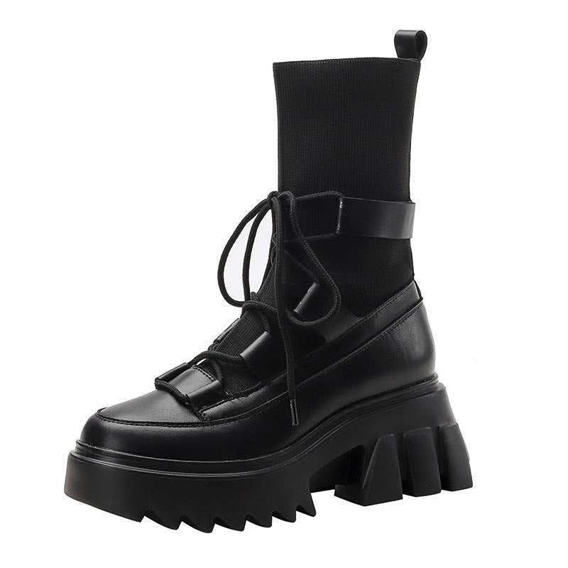 Platform women's lace-up boots in black stretch fabric, perfect for punk and alternative fashion styles.