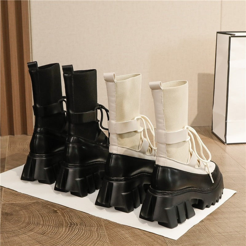 Platform women's lace-up boots in black and white stretch fabric, featuring chunky heels for autumn fashion.