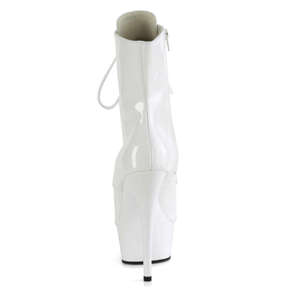 White 6-inch lace-up ankle boots with peep toe and side zip, showcasing a glossy finish and commanding platform style.