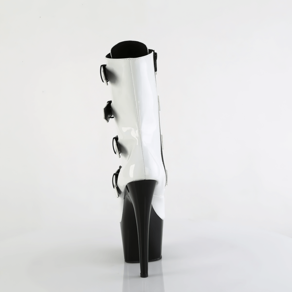 Back view of Pleaser ankle boots featuring a shiny black and white design with buckle straps and a towering 7-inch heel.