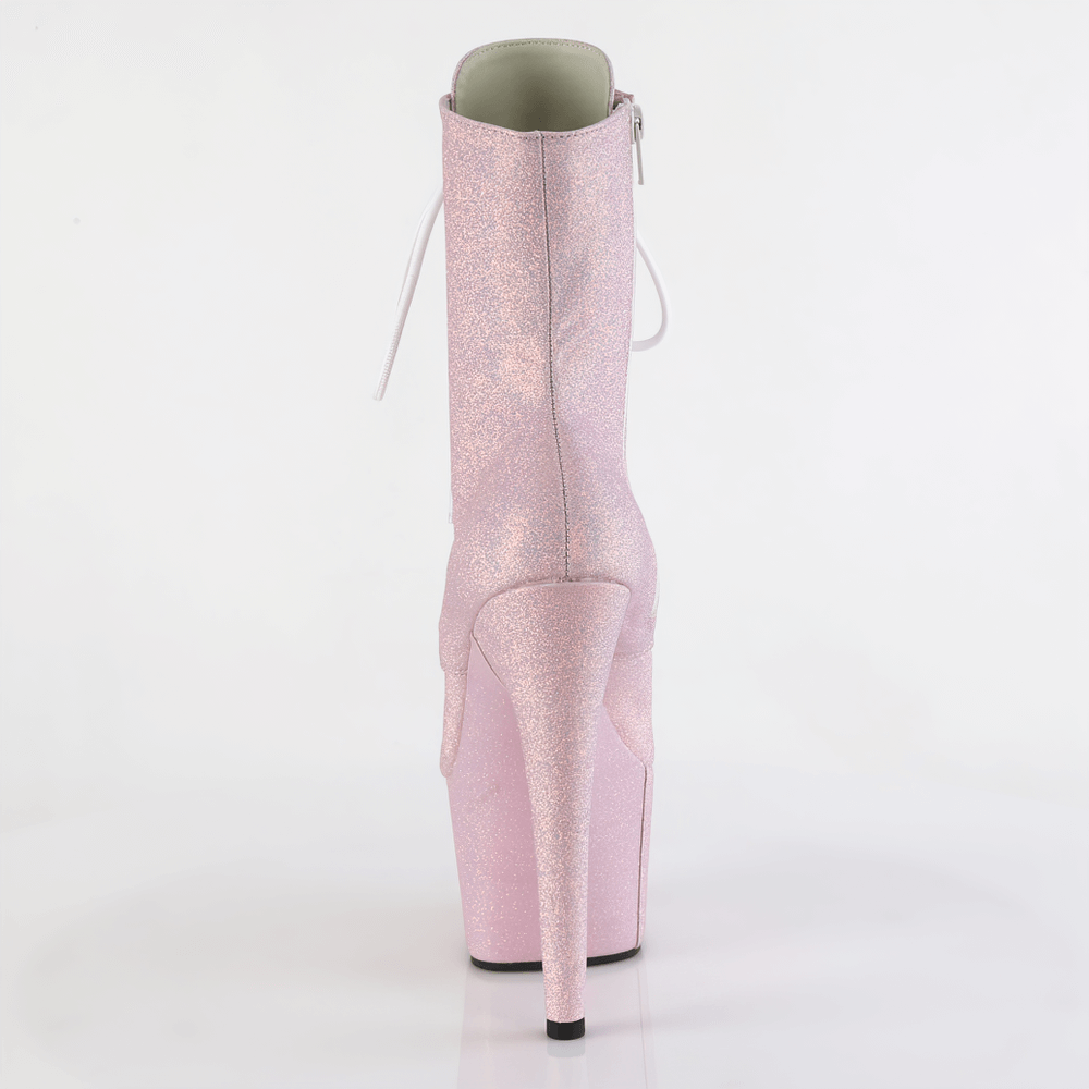 Baby pink glitter ankle boots with a 7-inch heel and side zip closure, perfect for making a bold fashion statement.