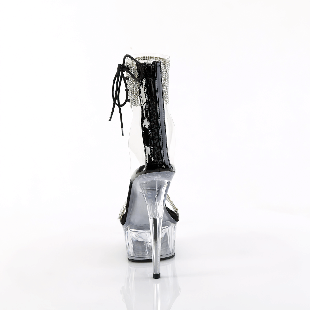 Back view of PLEASER black and clear sandals with rhinestone cuff and stiletto heel, showcasing elegant side lacing.