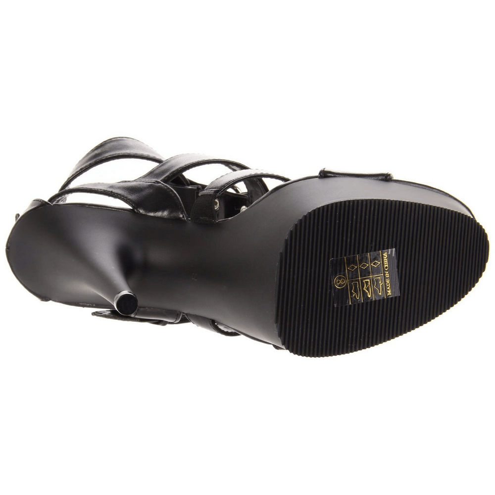Underneath view of PLEASER black platform sandals featuring strappy design and studded accents, showcasing the sole and brand logo.