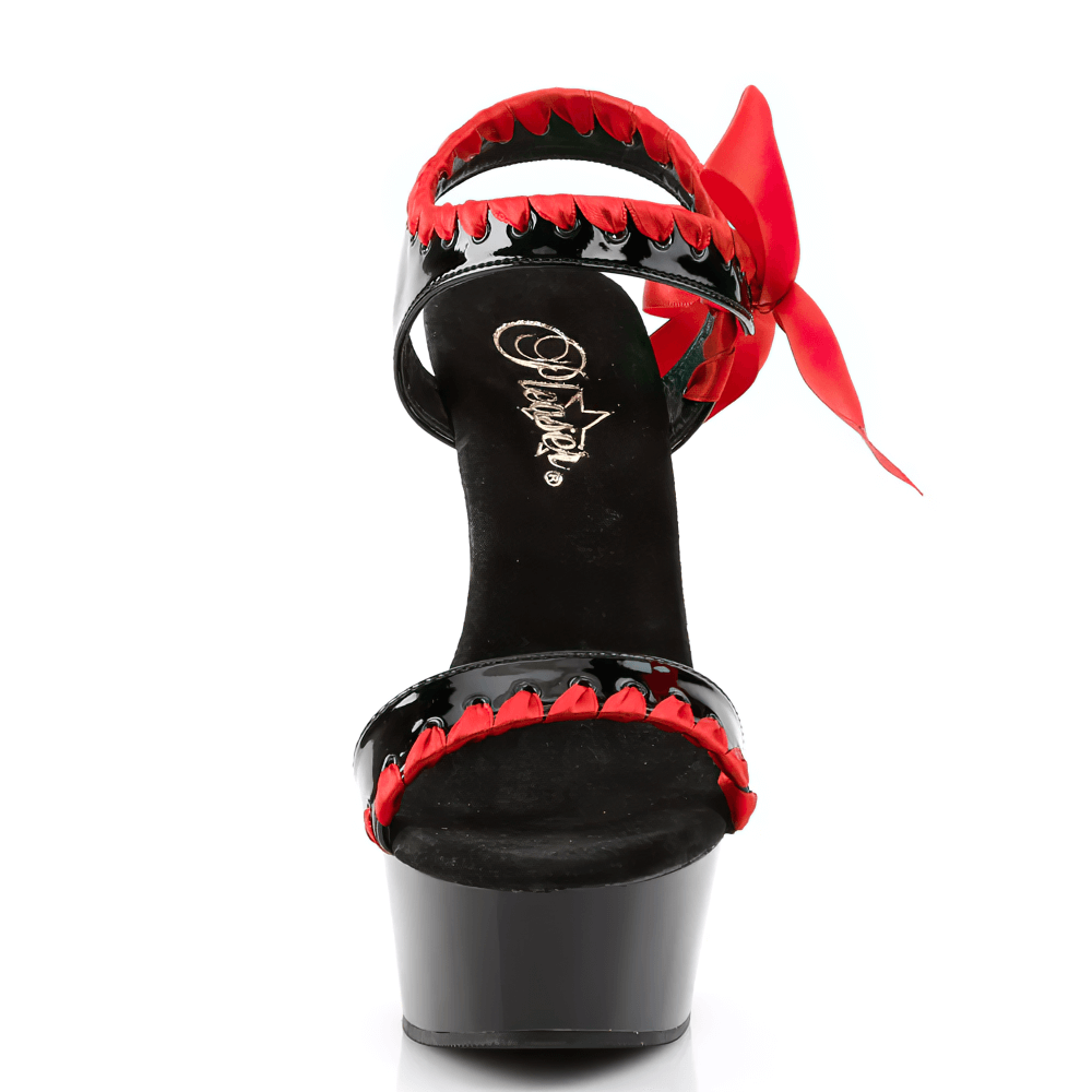 Elegant black stilettos with red bow detail and peep-toe design, featuring a 6-inch heel and playful side accents.