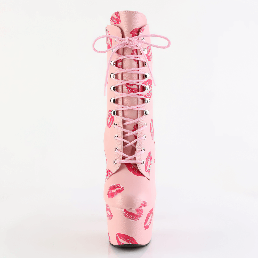Women's pink lace-up ankle boots with red lips print and high platform, stylish and bold footwear choice.