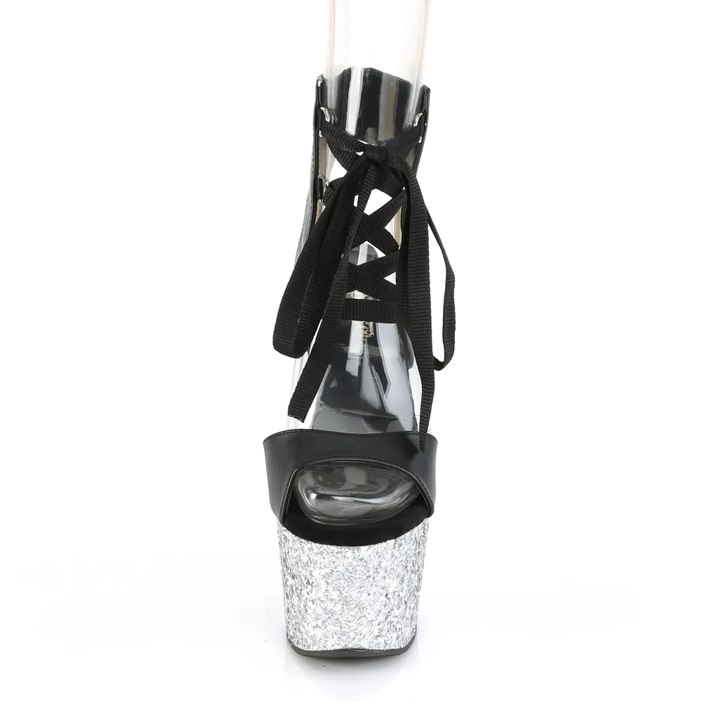 Black and silver lace-up ankle sandals with a high heel and glitter platform, perfect for confident and stylish women.