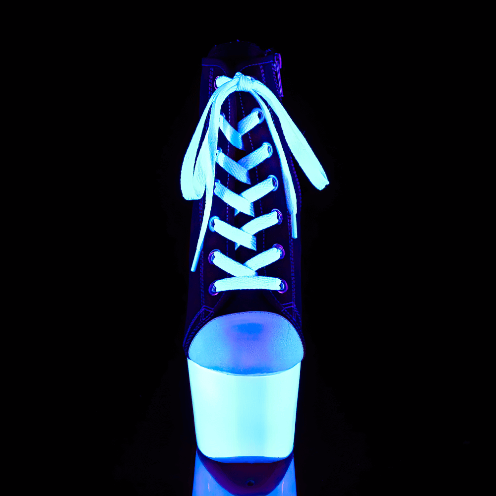 High-top Pleaser boots with UV reactive platform glowing in blue light, featuring a dramatic design and full zip closure.