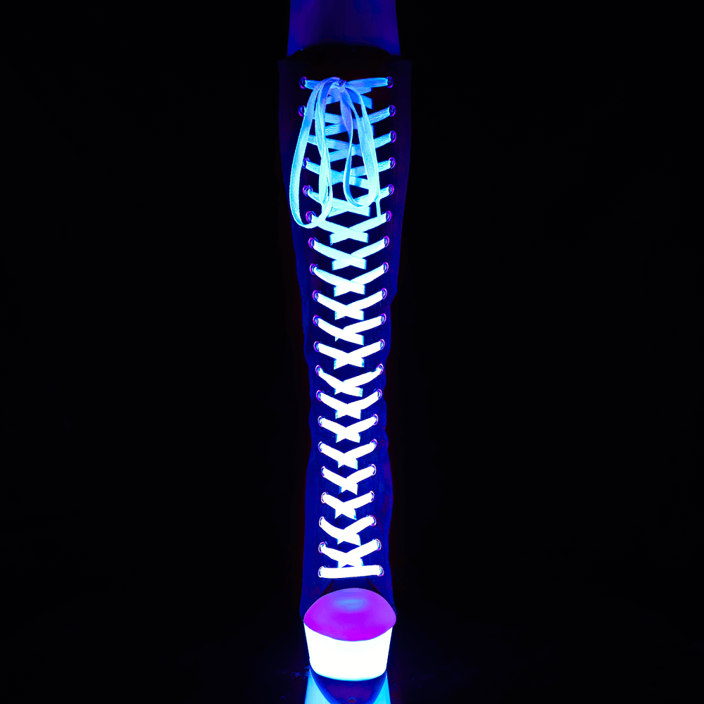 Knee-high lace-up canvas sneaker boots with blacklight-reactive glow and striking platform heel.