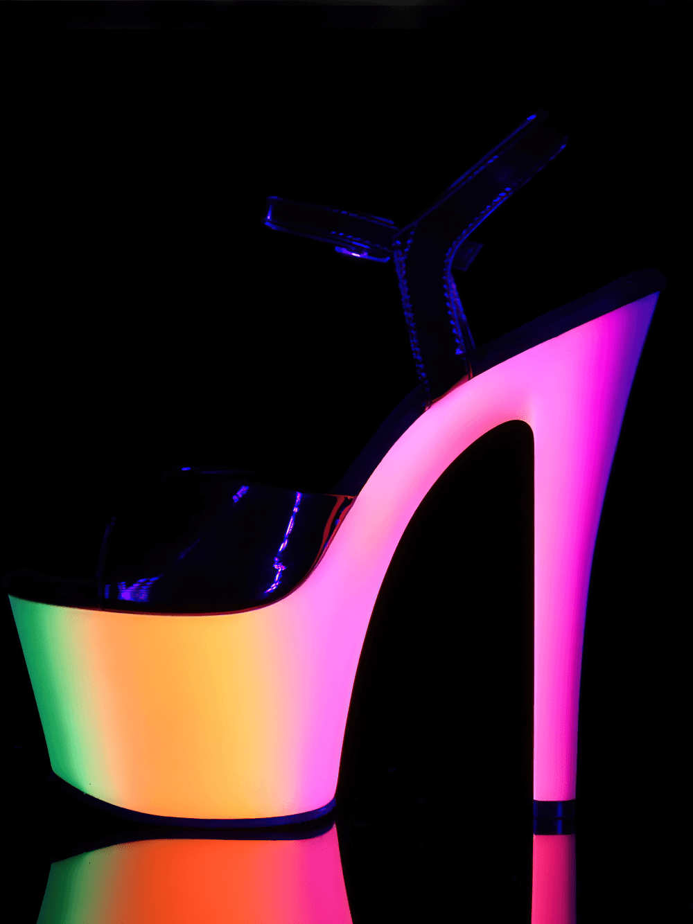 Vibrant PLEASER Neon UV Reactive Platform Sandals with 7-inch heel glowing under UV light.