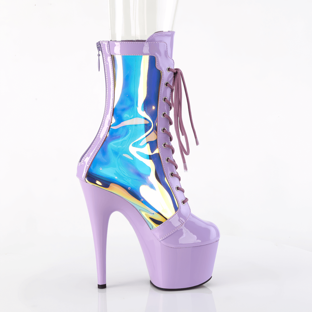 Bold purple stiletto boots with holographic panels and lace-up front, showcasing a striking 7-inch heel.