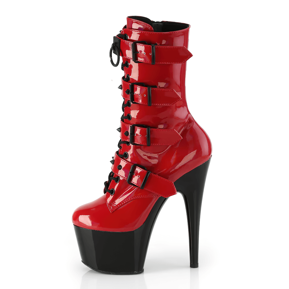 Edgy red and black studded ankle boots with 7-inch heels and lace-up design.
