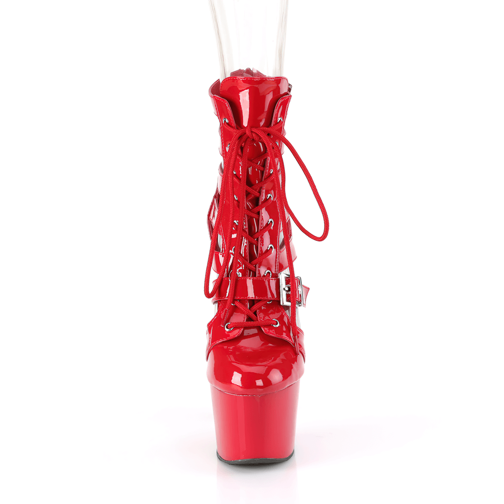 Bold red lace-up cage booties with platforms, featuring buckles and a striking 7-inch heel for a fierce look.