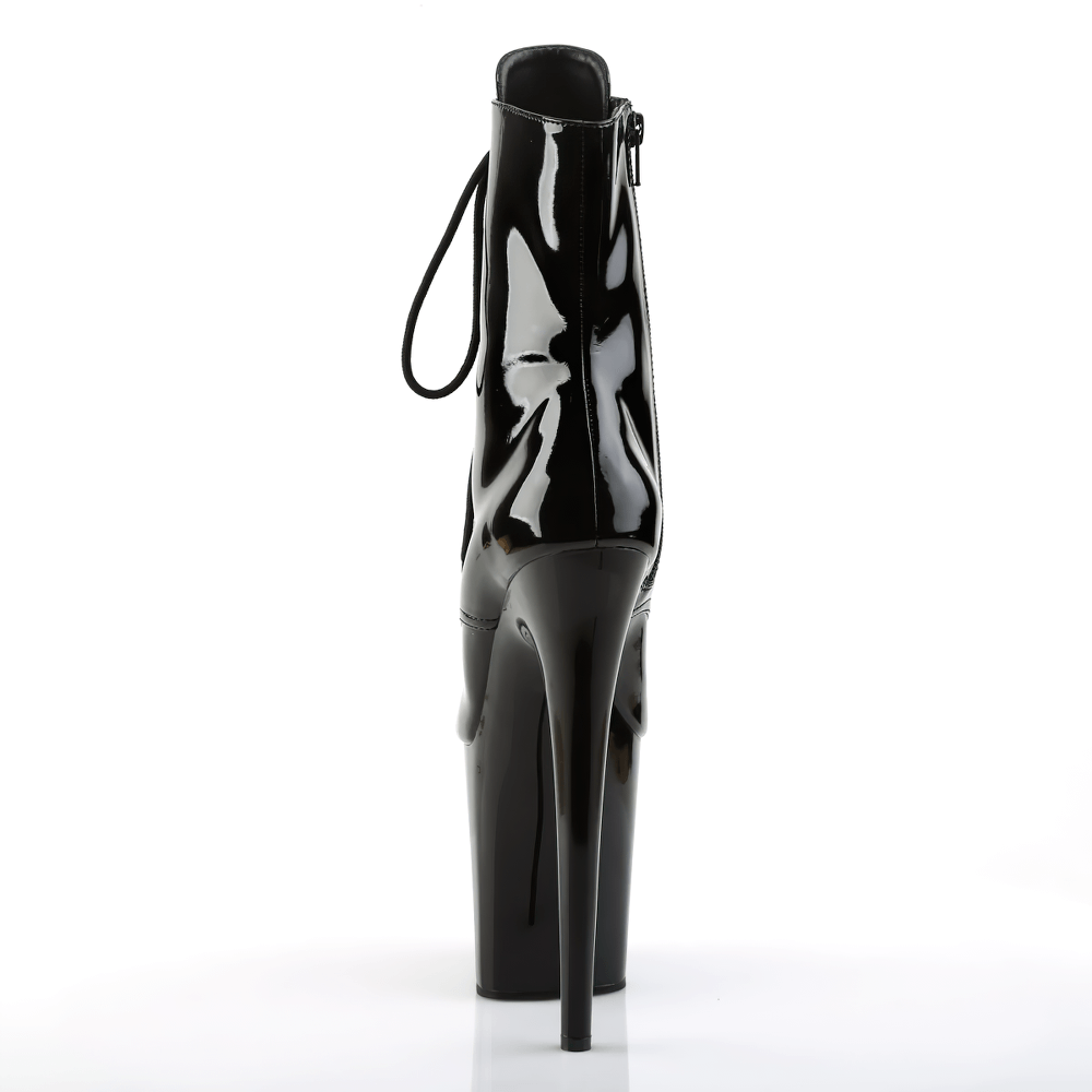 Back view of PLEASER black stiletto boots with a shiny finish, lace-up detail, and high heel for a bold look.
