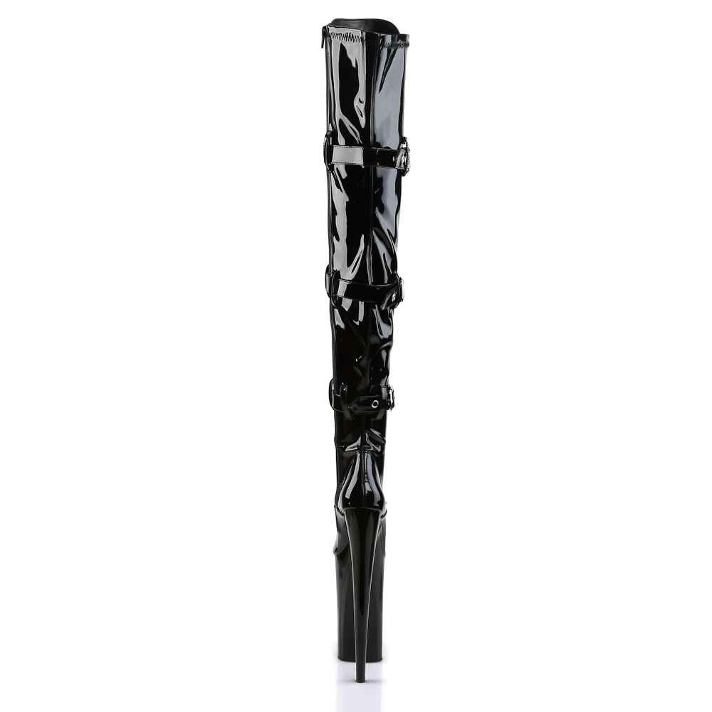 Black thigh high stiletto boots with triple buckles and ribbon lacing, showcasing a striking 10-inch heel.