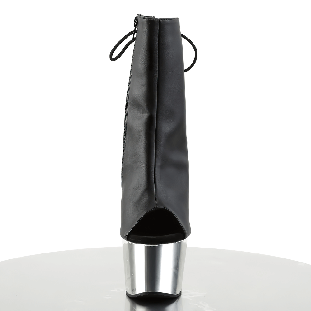 Edgy black ankle boot with open toe, chrome heel, lace-up back, and hidden pocket, perfect for stylish statement-making.