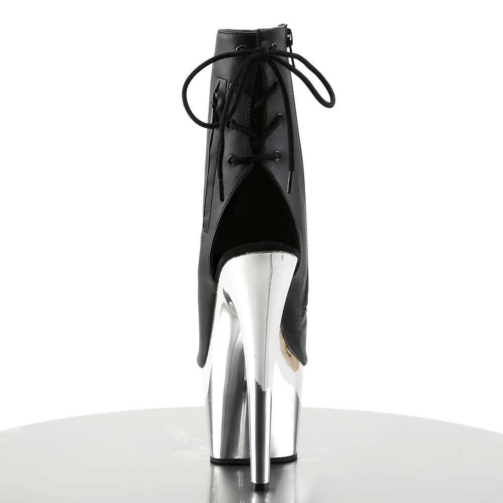 Edgy black ankle boots with chrome heel and lace-up back, showcasing a striking platform design for a stylish look.
