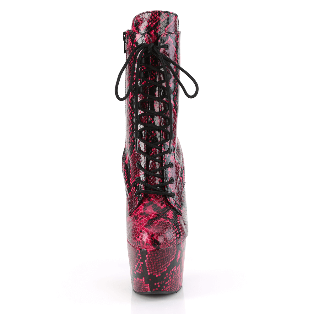 Exotic pink snakeskin platform ankle boots with lace-up front and statement heels.