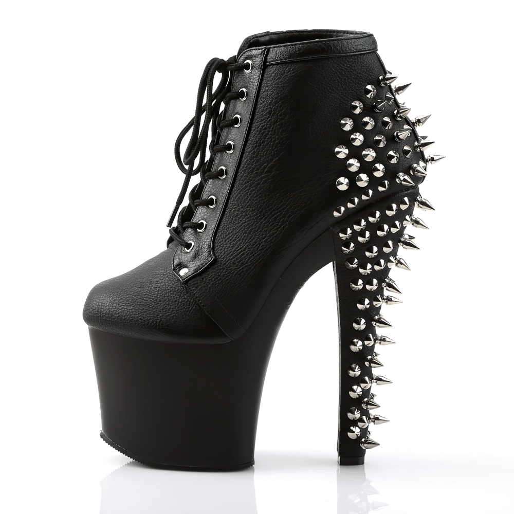 Edgy spiked black ankle boots with 7-inch stiletto heel and lace-up design, perfect for bold fashion statements.