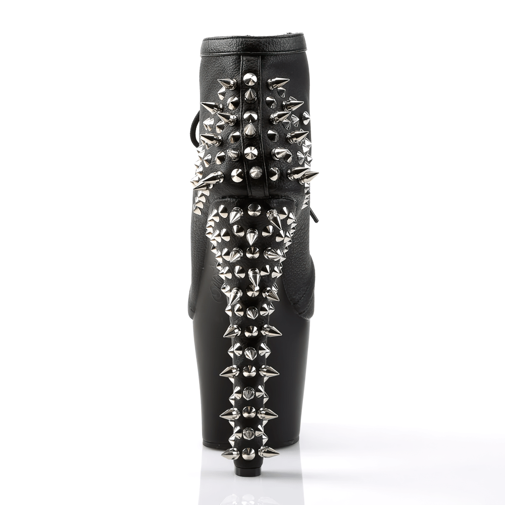 Black ankle boots with spiked heel and platform, showcasing edgy lace-up design and dramatic stiletto heel.