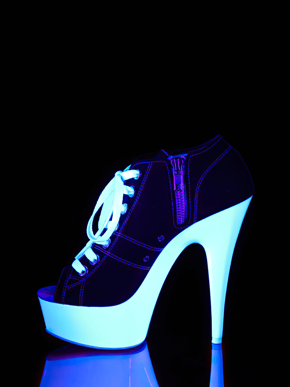 PLEASER lace-up stiletto heels with UV reactive platform, striking black and white design, perfect for nightlife.