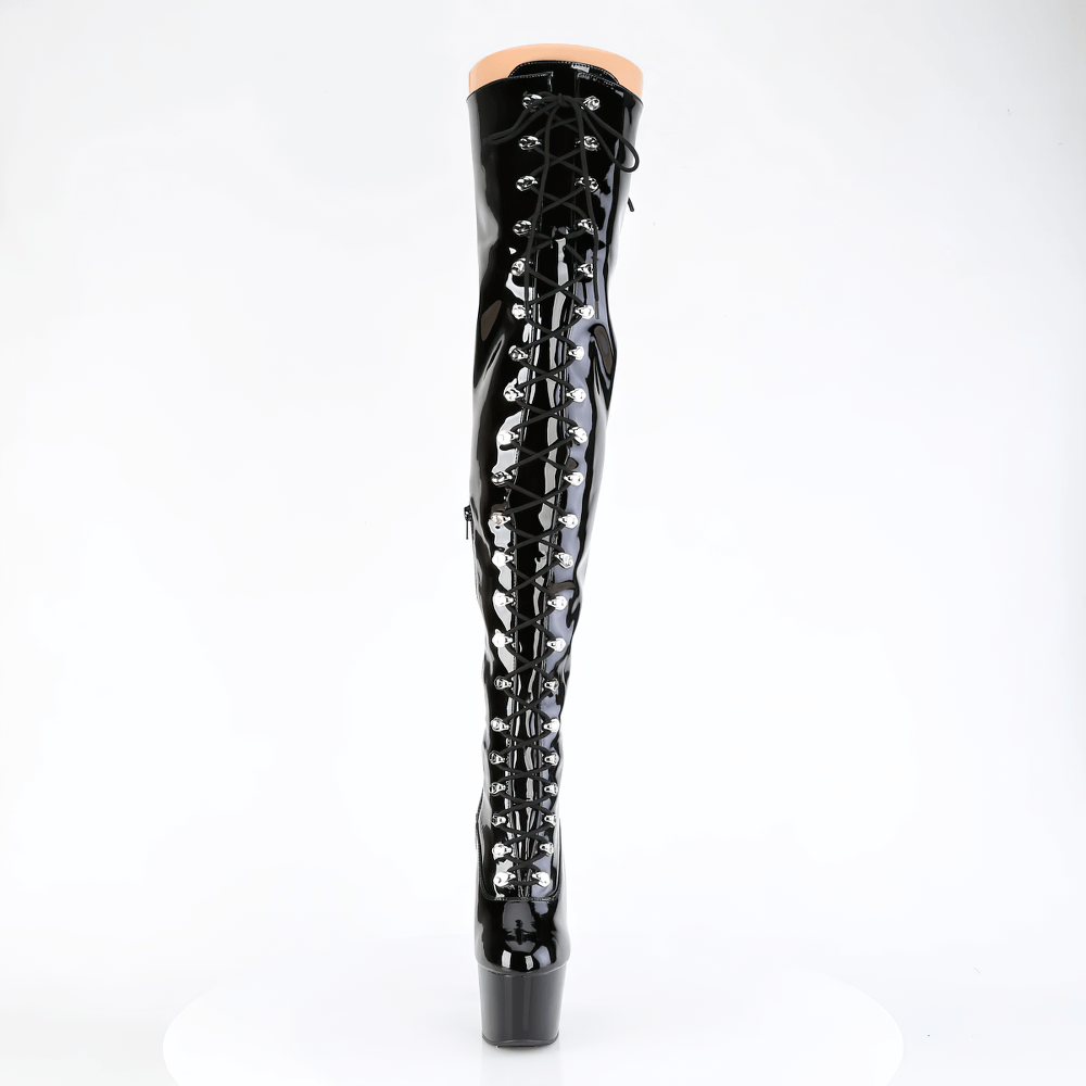 Black lace-up thigh high boots with a stiletto heel and back slit detail, perfect for a bold fashion statement.