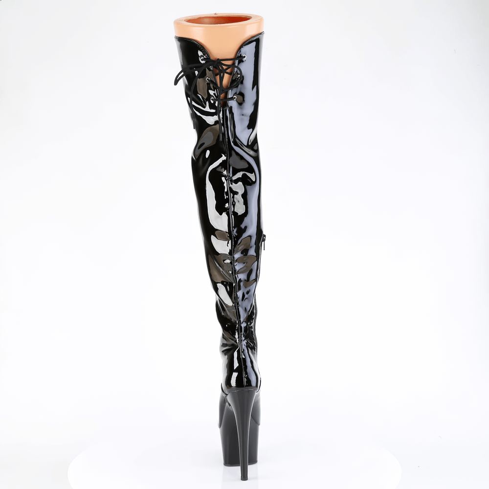 Black stiletto thigh-high boots with lace-up detail and back slit accent, showcasing a glossy finish.