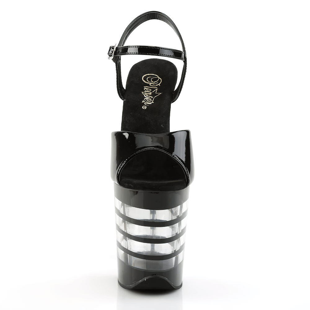 Elegant black platform ankle strap heels with clear block heel for a striking look.