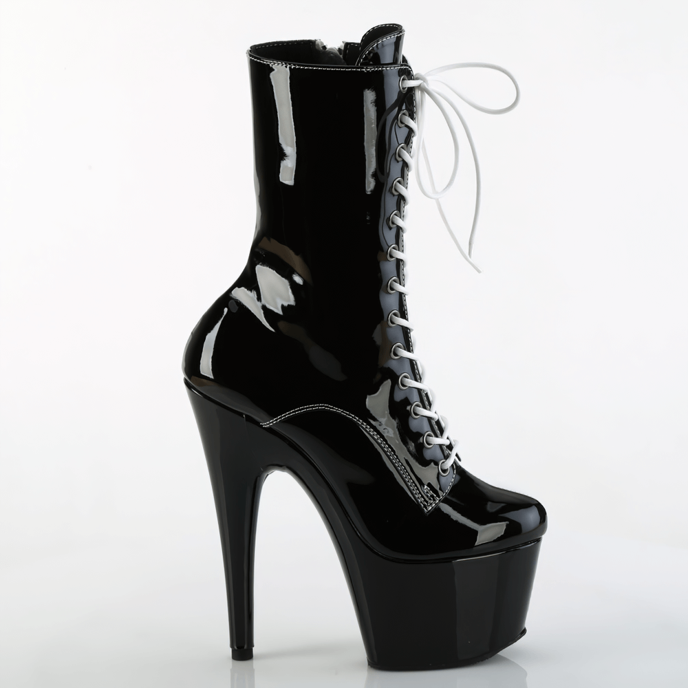 Sleek black two-tone lace-up ankle boots with high heel and platform for a bold fashion statement.